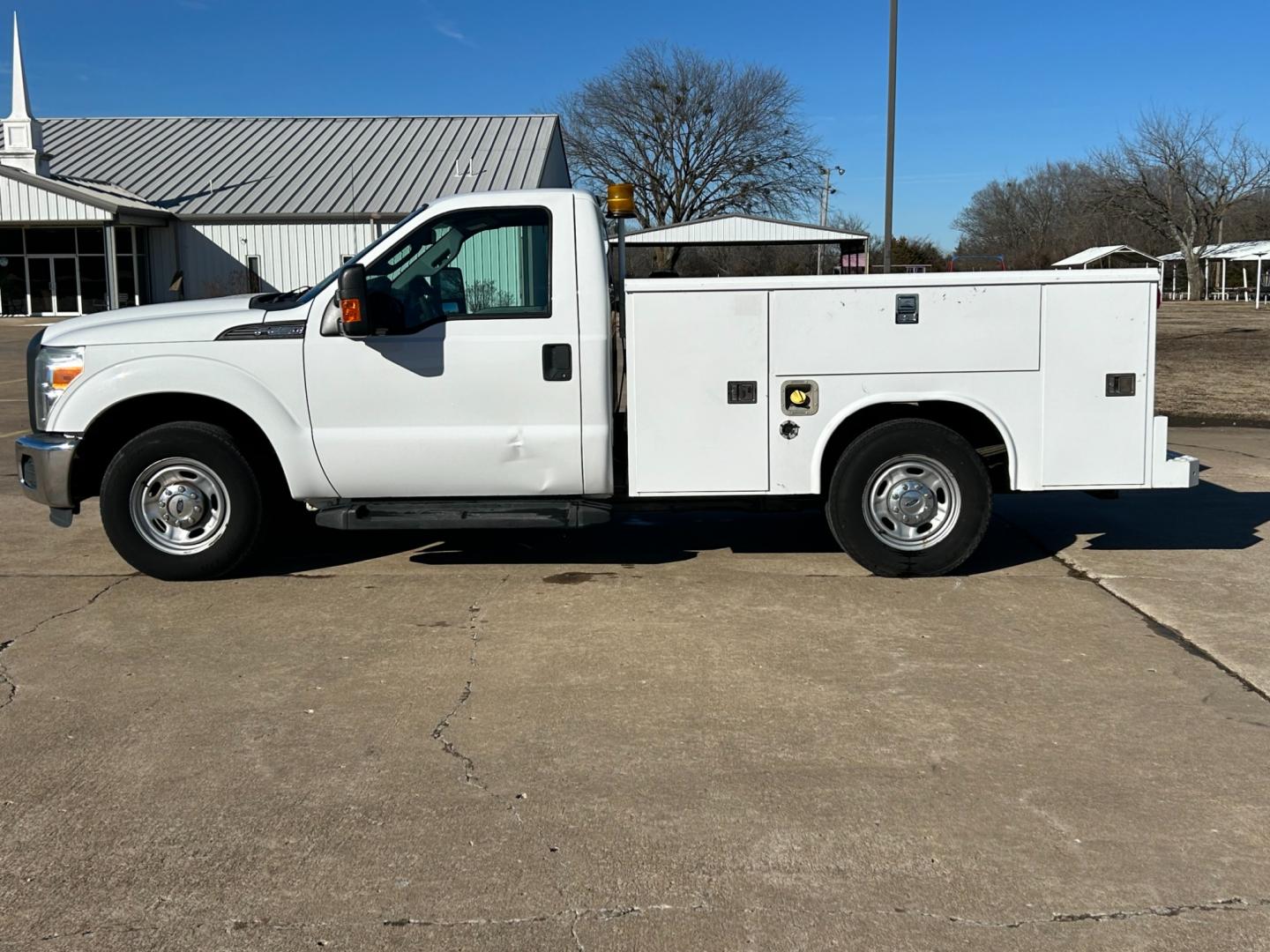 2015 White /Gray Ford F-250 SD (1FDBF2A62FE) with an 6.2L V8 F SOHC 16V engine, 6-Speed Automatic transmission, located at 17760 Hwy 62, Morris, OK, 74445, (918) 733-4887, 35.609104, -95.877060 - Photo#7